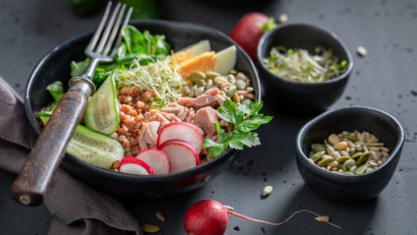 Healthy Nicoise salad as a balanced meal for health.